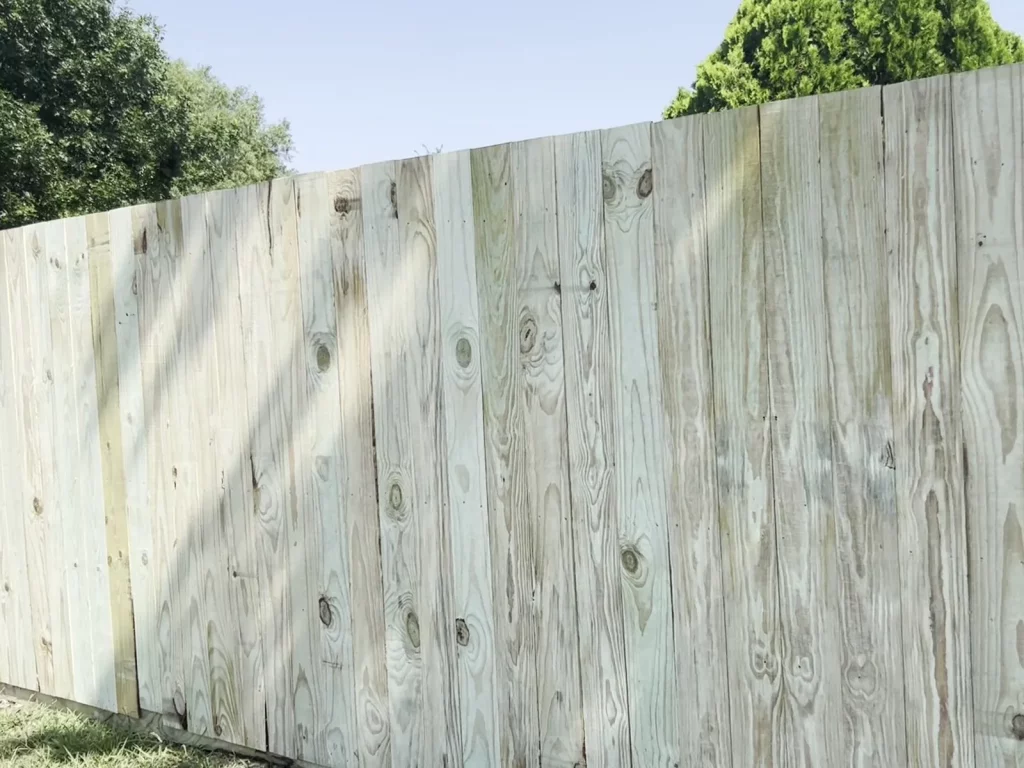 250 linear feet of 6 ft wood privacy fence enclosing a residential backyard in Venus, TX