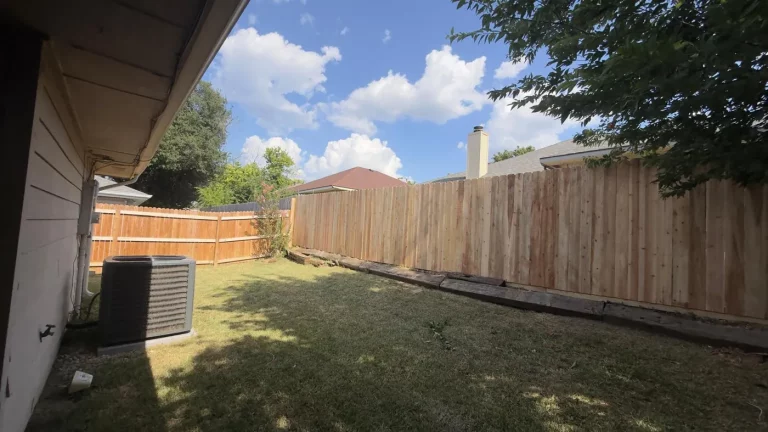 6 ft cedar fence in Irving, TX with side-by-side pickets replacing an old chain link boundary