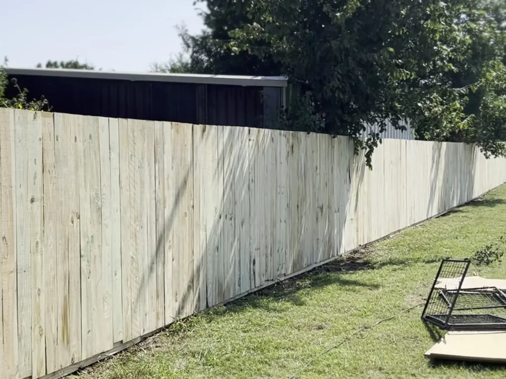 6 ft side by side fence installation in Venus, TX with a straight top line across the full run