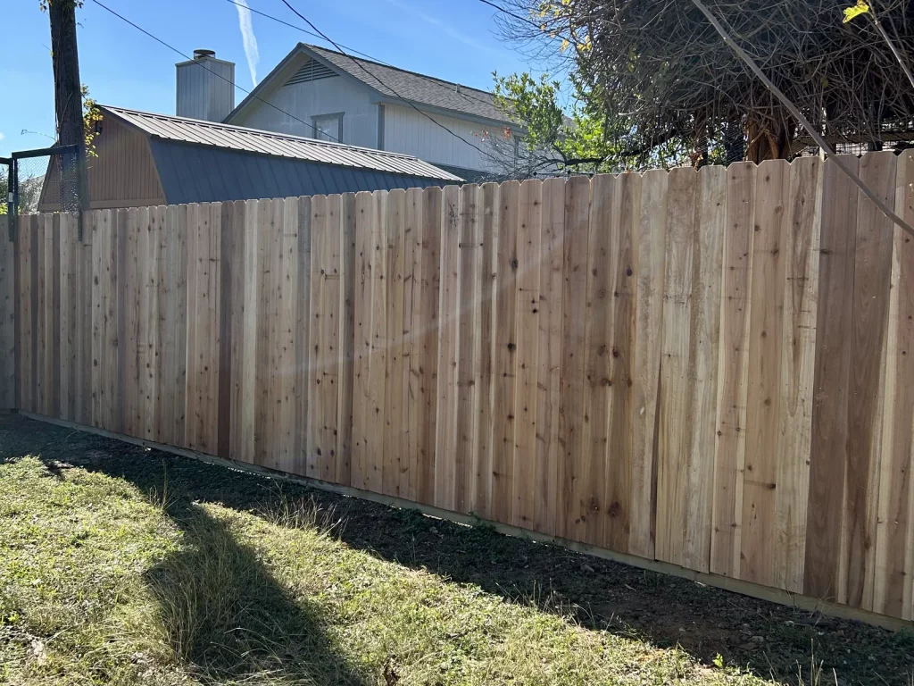 60 linear feet of new 6 ft cedar privacy fence running along a property line in Arlington, TX
