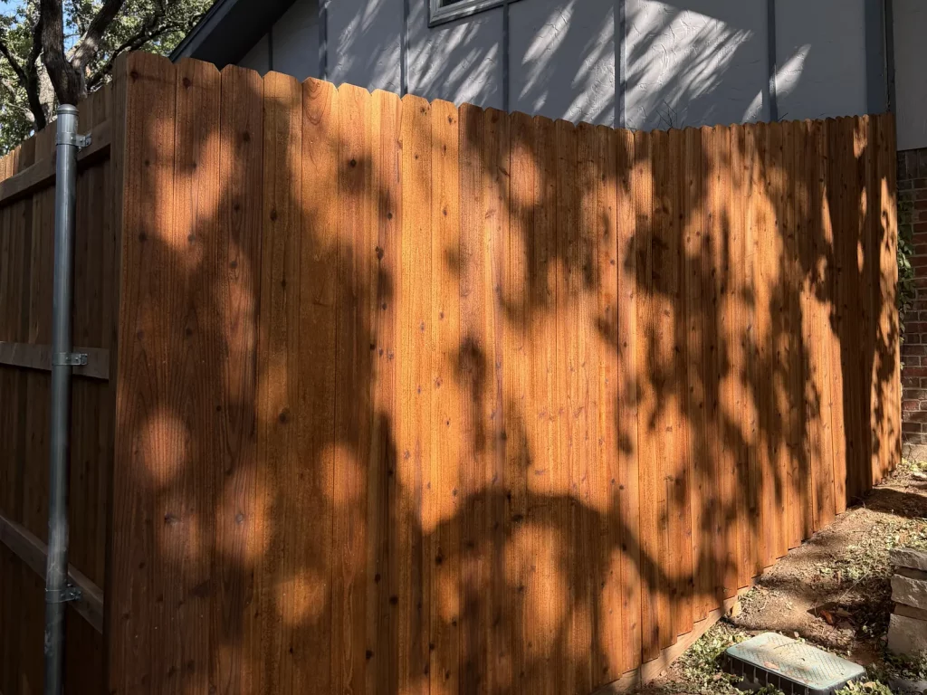 8 ft cedar privacy fence in Arlington, TX at the corner where the 80 ft run meets the 14 ft return