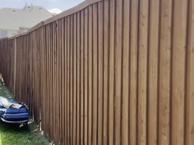 Old wood fence with daylight gaps between every picket before cedar fence replacement in Murphy, TX
