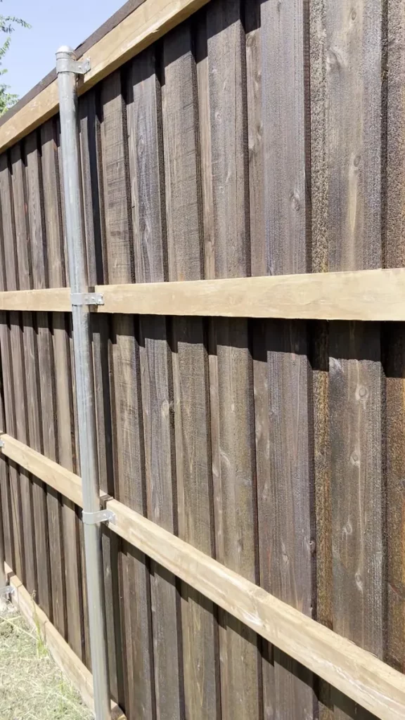 Cedar fence with cap, trim and galvanized posts in Grand Prairie, TX