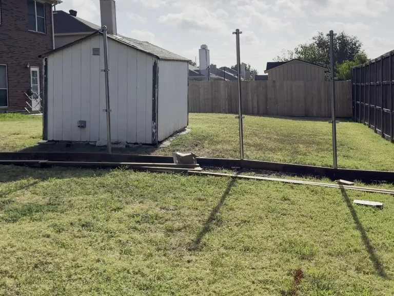 Old fence demolished during a cedar fence replacement in Arlington, TX