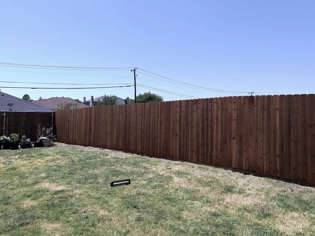 New cedar privacy fence turning the backyard corner in Arlington, TX