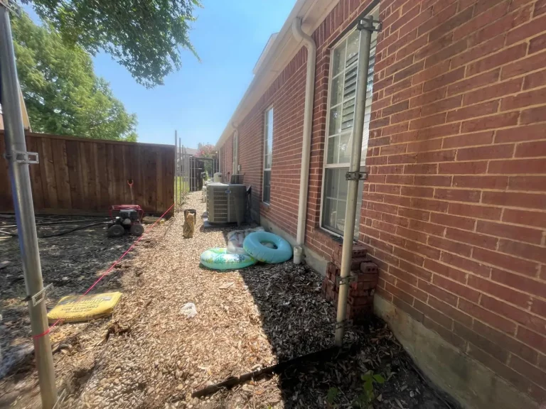 Side yard in Frisco, TX before the new 8 ft cedar fence was installed