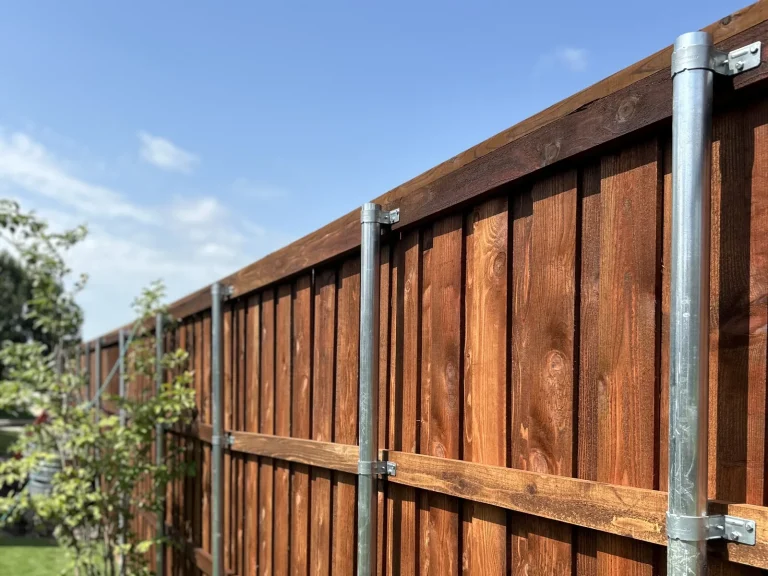 Finished privacy fence repair showing straight, secure panels in Fort Worth, TX