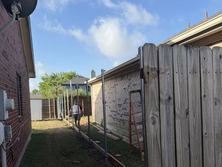 Espresso stain cedar fence finished along a side yard in Arlington, TX